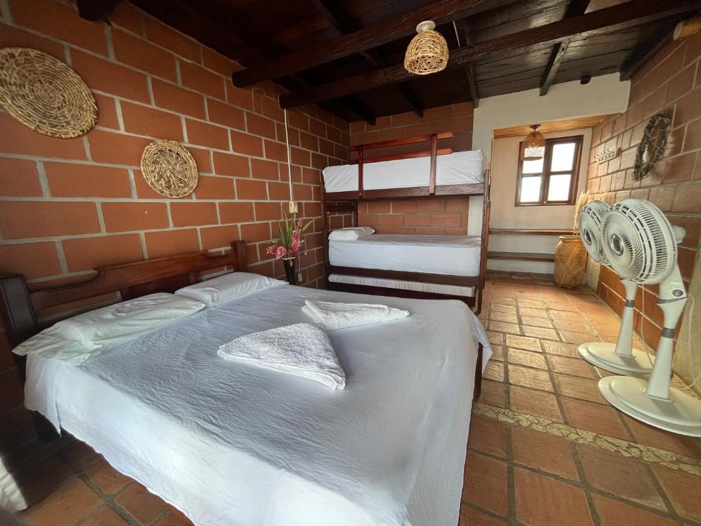 Llit o llits en una habitació de Hotel Katamaran