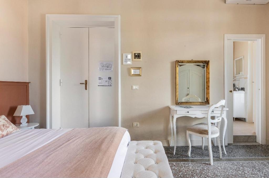 Postel nebo postele na pokoji v ubytování Joy's Bnb Ortigia