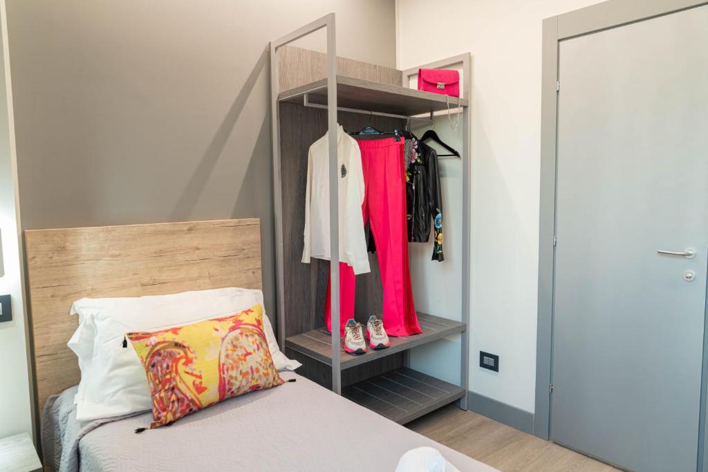 Postel nebo postele na pokoji v ubytování Hotel Ambrosiano