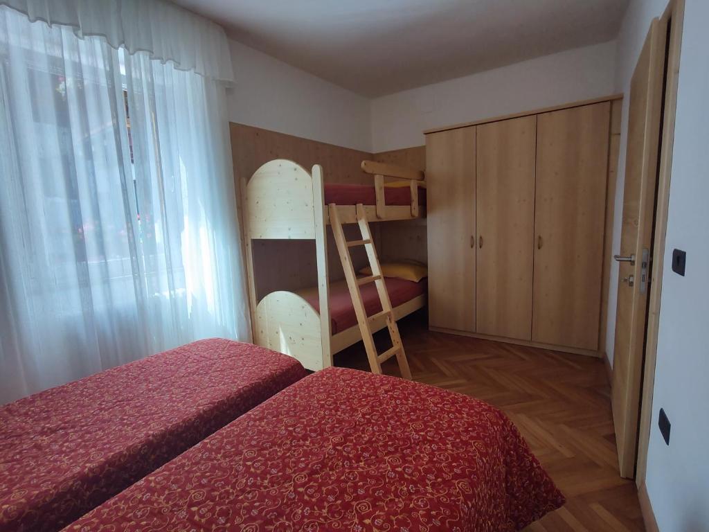 Postel nebo postele na pokoji v ubytování Residenza Arnica