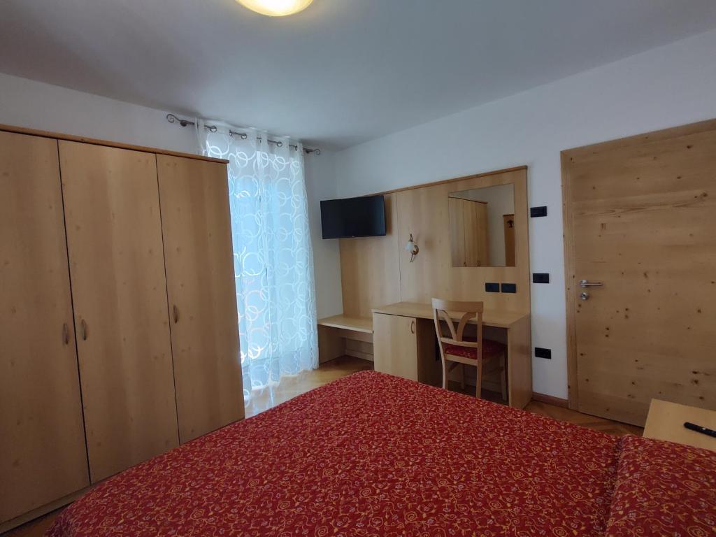 Postel nebo postele na pokoji v ubytování Residenza Arnica