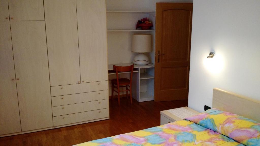 Postel nebo postele na pokoji v ubytování Residenza Arnica