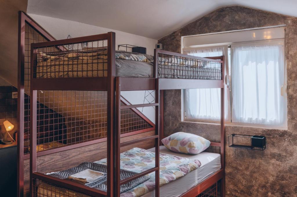 Postel nebo postele na pokoji v ubytování Q PODGORICA Beds,Rooms and more