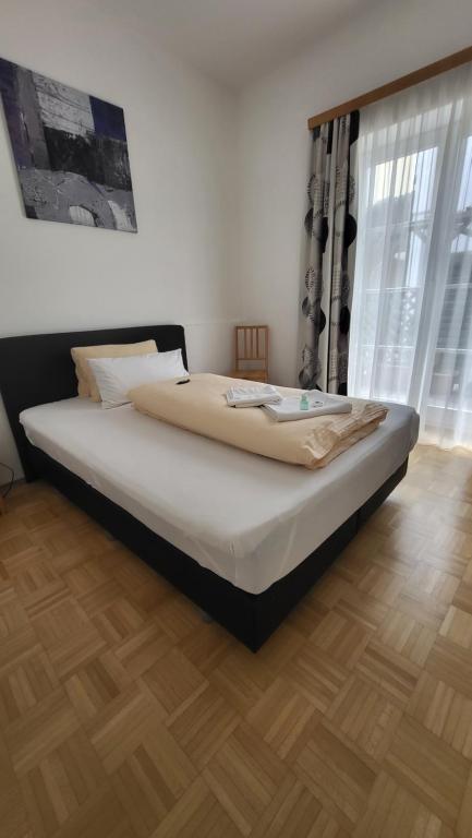 Postel nebo postele na pokoji v ubytování Gasthof Moser