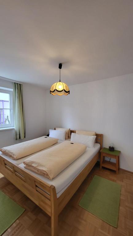 Postel nebo postele na pokoji v ubytování Gasthof Moser