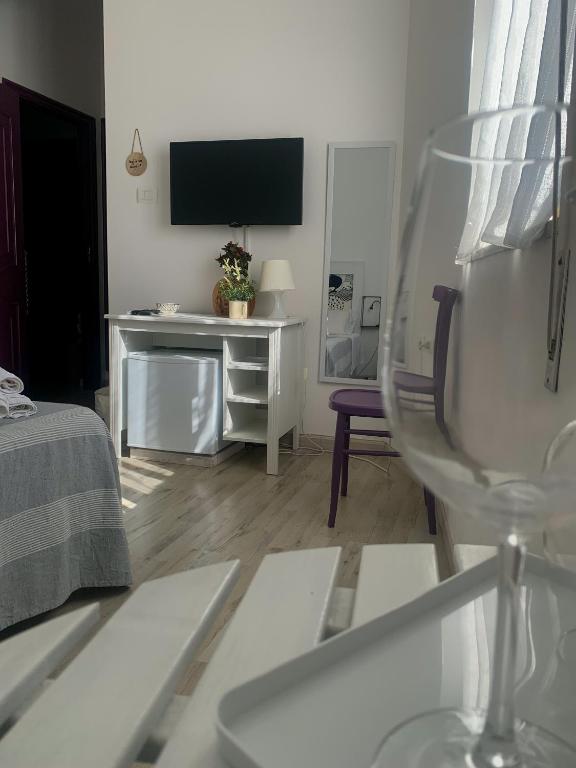 TV a/nebo společenská místnost v ubytování B&B Giallolumia