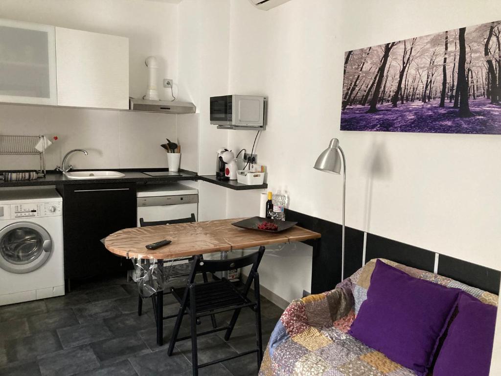Kuchyňa alebo kuchynka v ubytovaní ASV Apartments