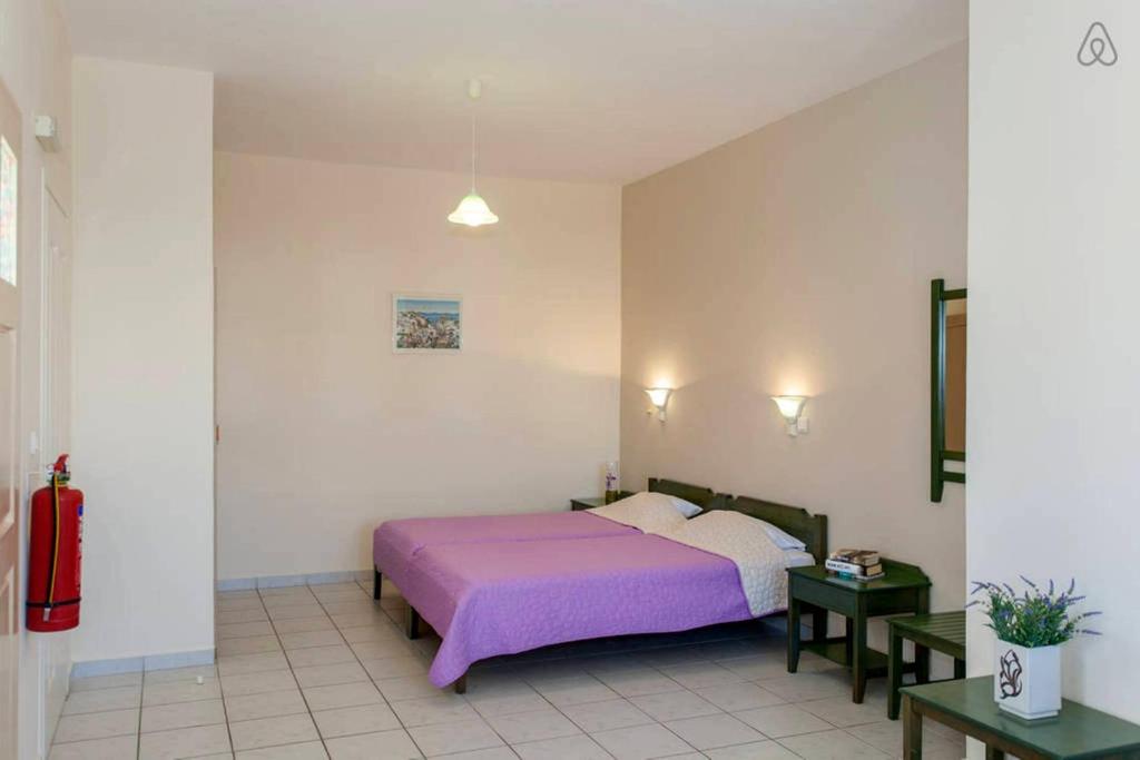Posteľ alebo postele v izbe v ubytovaní Armonia Apartments