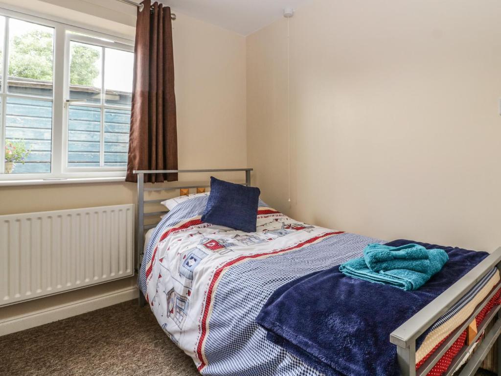 Postel nebo postele na pokoji v ubytování 8A Rosewood Avenue