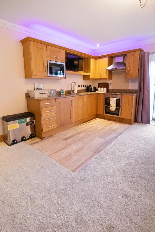 Kuchyň nebo kuchyňský kout v ubytování The Lodge - Studio Apartment's