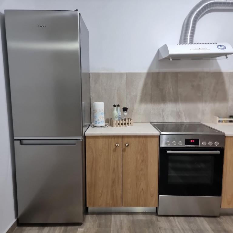 Kuchyň nebo kuchyňský kout v ubytování Sea View apartment