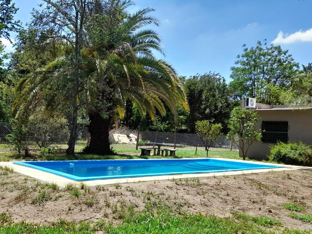 La pileta dentro o cerca de Casa Quinta Las Casuarinas