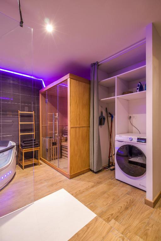 Posteľ alebo postele v izbe v ubytovaní Escapade en Bord de mer avec Sauna et Spa Privés