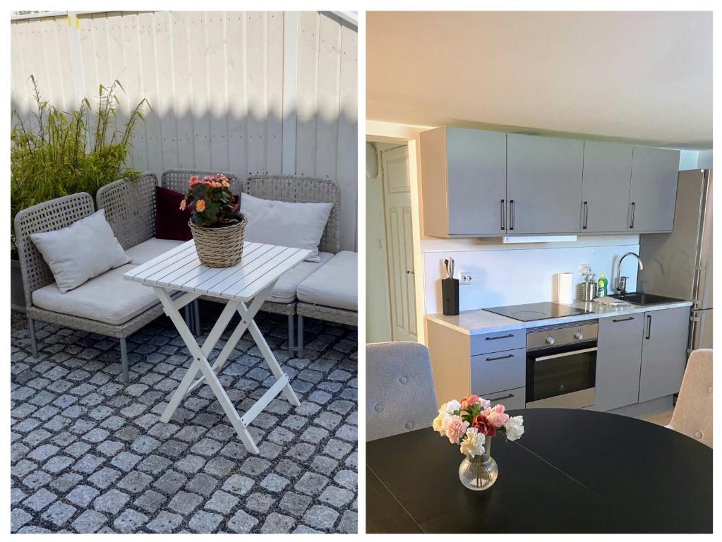 eine Küche und ein Wohnzimmer mit einem Tisch und einer Küche in der Unterkunft Modern appartment in classic house, close to beach and city center in Kristiansand