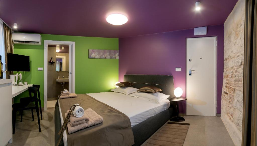 Posteľ alebo postele v izbe v ubytovaní Annie's stone Studio & Room