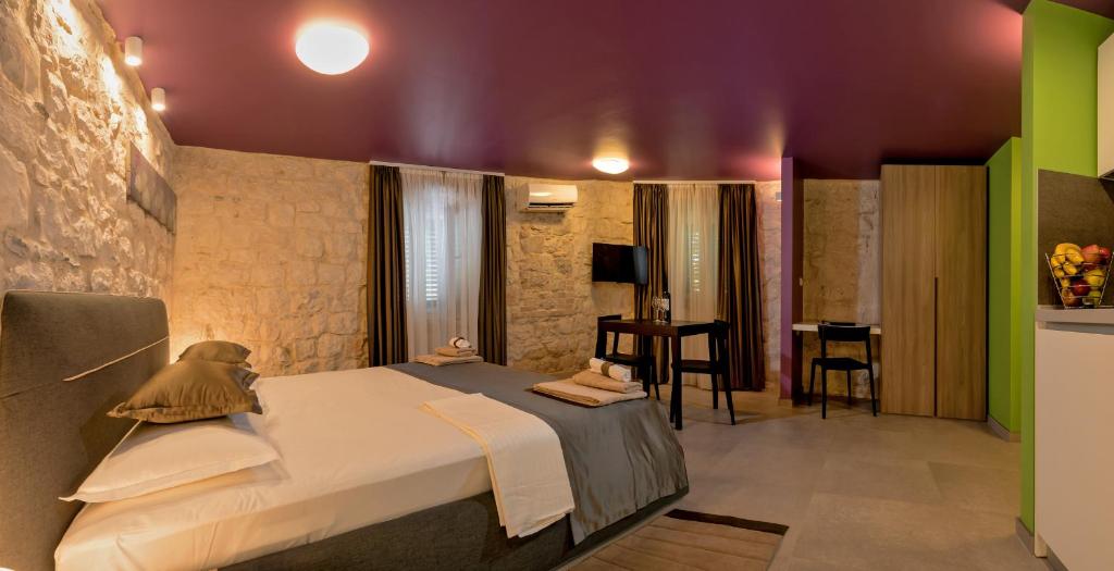 Posteľ alebo postele v izbe v ubytovaní Annie's stone Studio & Room
