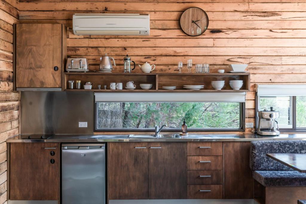 Kuchyň nebo kuchyňský kout v ubytování DULC Cabins