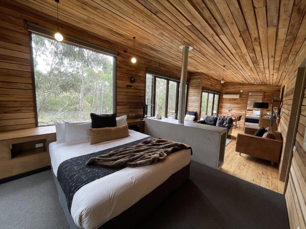 Postel nebo postele na pokoji v ubytování DULC Cabins