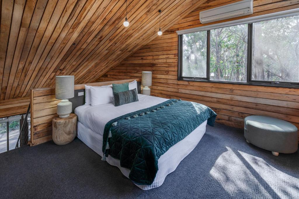 Postel nebo postele na pokoji v ubytování DULC Cabins
