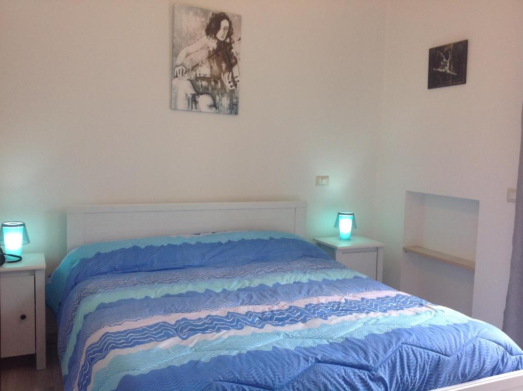 Postel nebo postele na pokoji v ubytování B&B Preludio