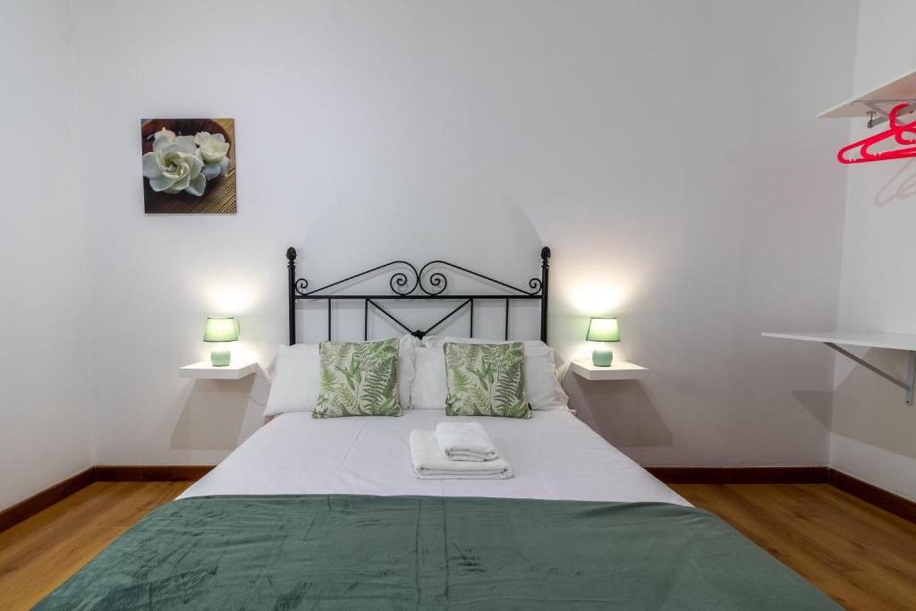 Postel nebo postele na pokoji v ubytování Villa de Pino