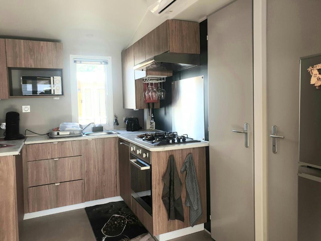Kuchyňa alebo kuchynka v ubytovaní Mar Estang LUXURY Eden 45m2