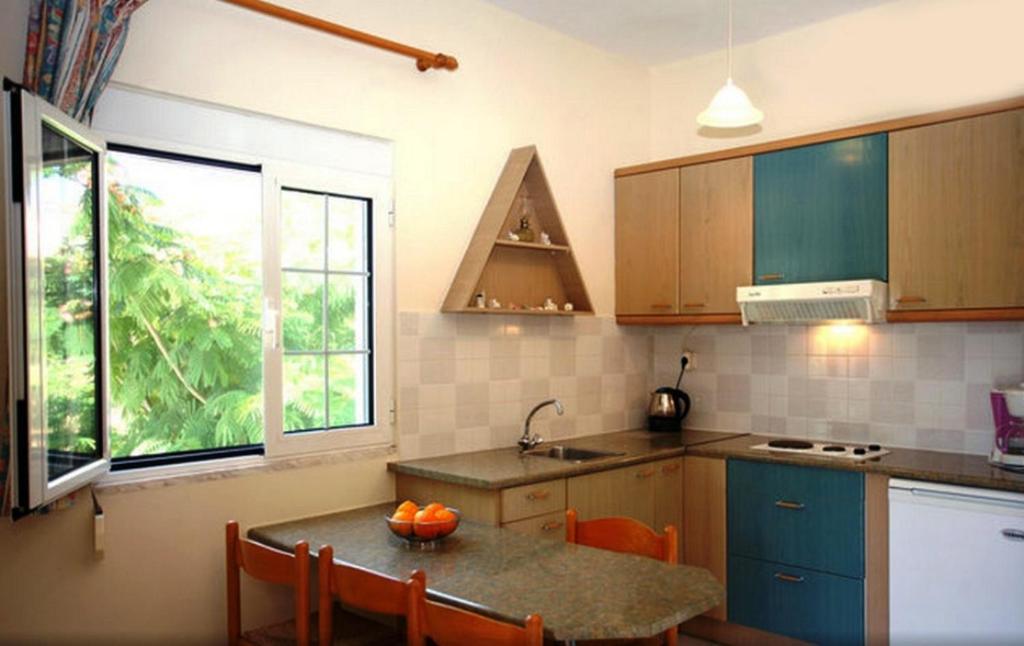 Kuchyňa alebo kuchynka v ubytovaní Armonia Apartments