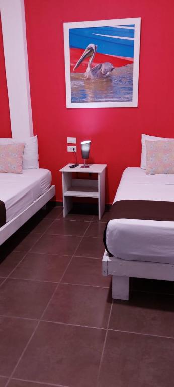 Postel nebo postele na pokoji v ubytování Hotel-Restaurante Ancora