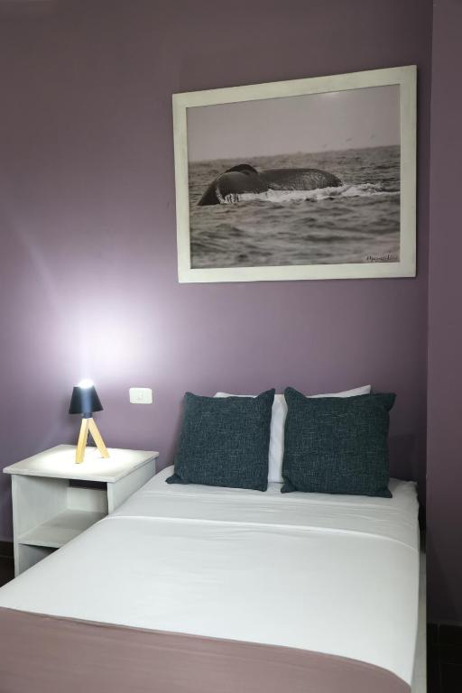 Postel nebo postele na pokoji v ubytování Hotel-Restaurante Ancora