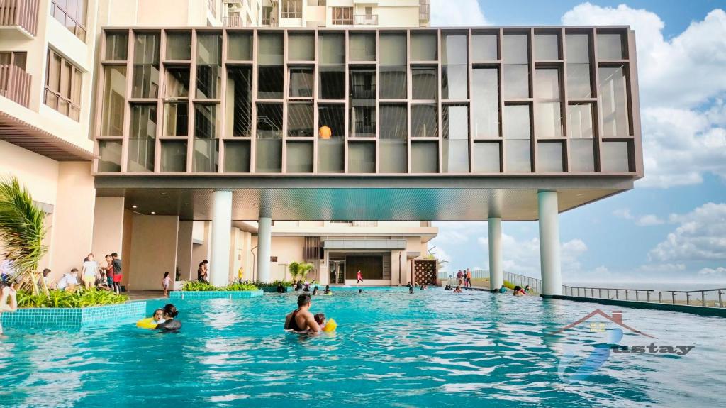 a rendering of a swimming pool in front of a building at Bali Residence Seaview I 2BR I 8-10pax I Waterpark I JonkerSt in Melaka