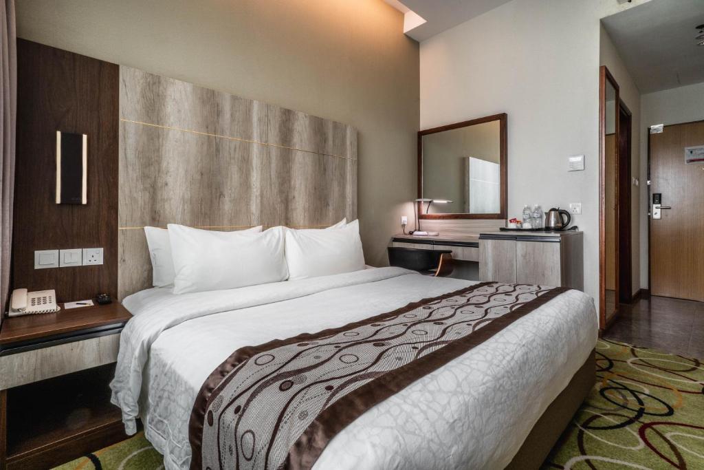 Postel nebo postele na pokoji v ubytování Ano Hotel