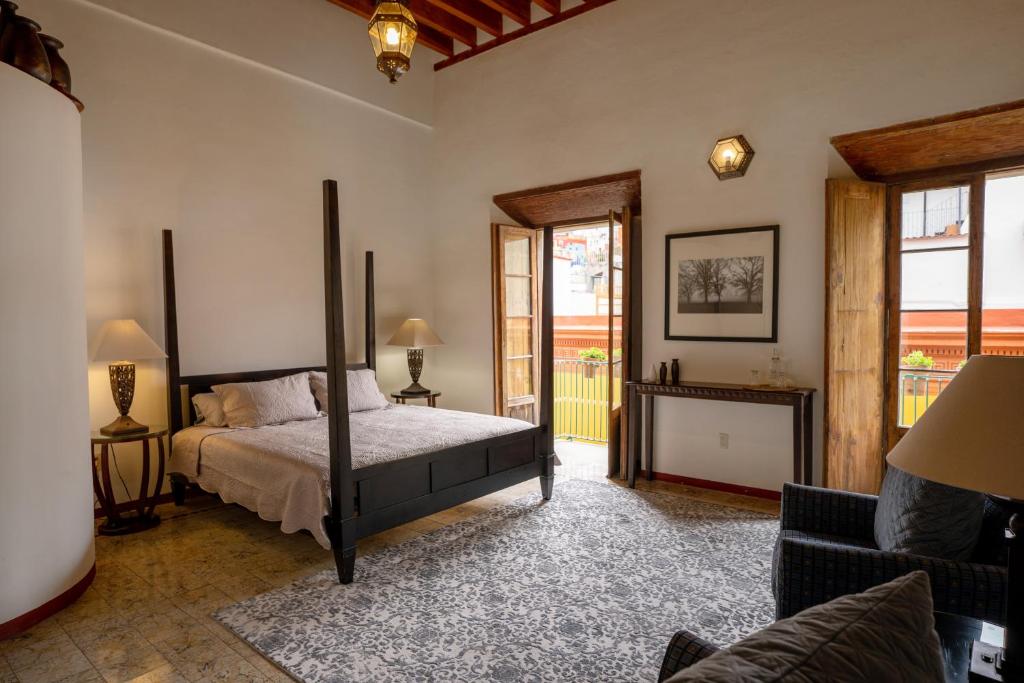 Ένα ή περισσότερα κρεβάτια σε δωμάτιο στο La Casa Veintidós