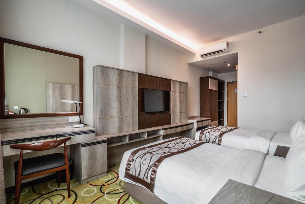 Postel nebo postele na pokoji v ubytování Ano Hotel