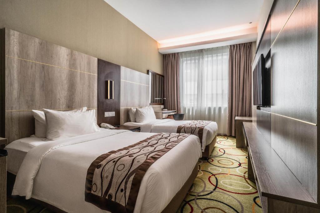 Postel nebo postele na pokoji v ubytování Ano Hotel