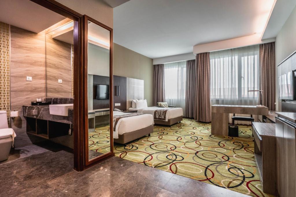 Postel nebo postele na pokoji v ubytování Ano Hotel