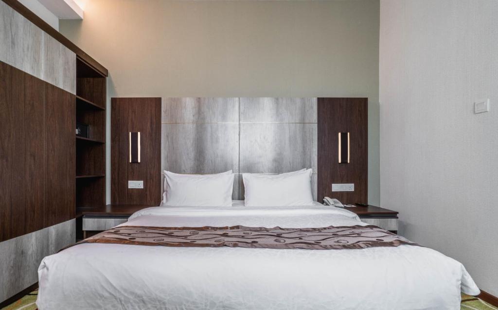 Postel nebo postele na pokoji v ubytování Ano Hotel