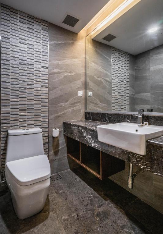 Koupelna v ubytování Ano Hotel