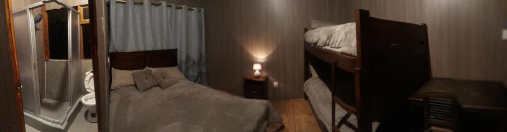 Postel nebo postele na pokoji v ubytování EL TRAPICHE