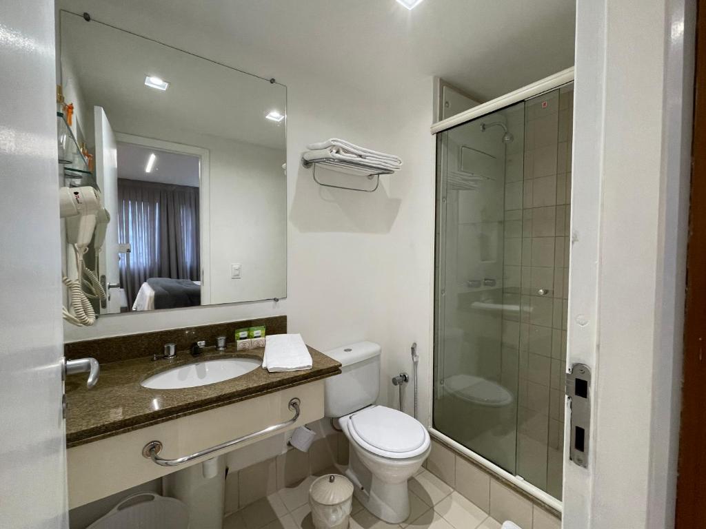 Ett badrum på Flat Whynd Paulista Al Campinas 540