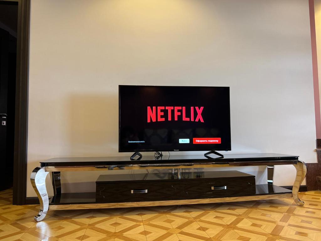 TV a/nebo společenská místnost v ubytování Grand Hills