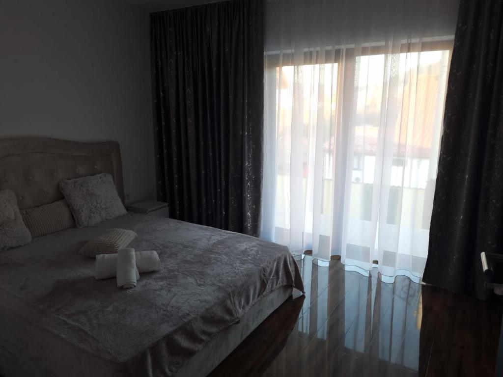 Postel nebo postele na pokoji v ubytování Izabella Guest House