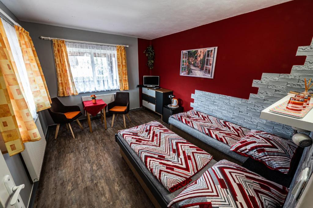 Postel nebo postele na pokoji v ubytování Penzion U Tulaka