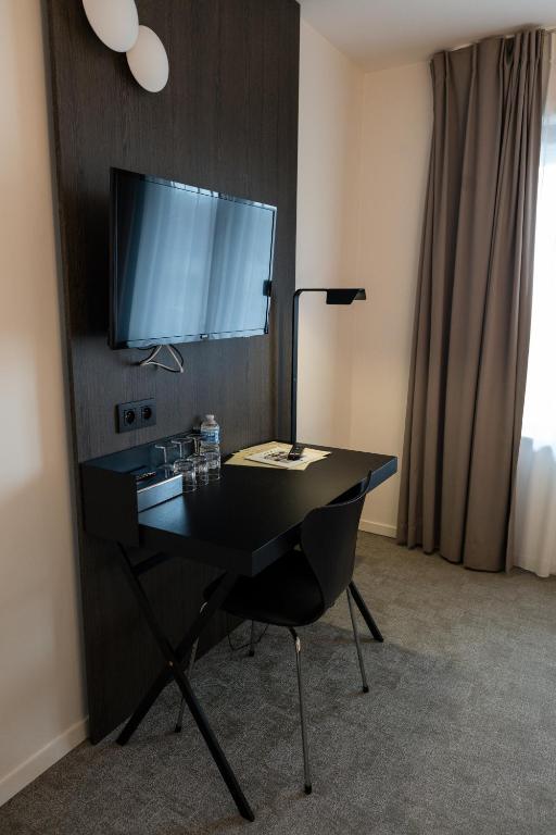 Kuchyň nebo kuchyňský kout v ubytování Hotel Apostroff