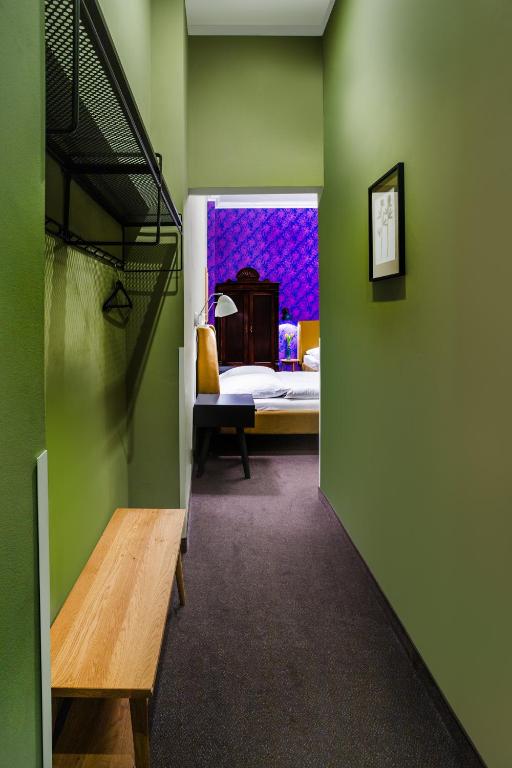 Postel nebo postele na pokoji v ubytování Hotel BELLEVUE am Kurfürstendamm