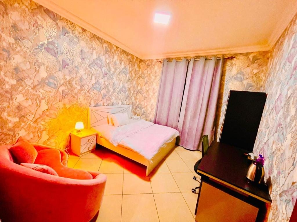 TV a/nebo společenská místnost v ubytování Jin Jie Residence