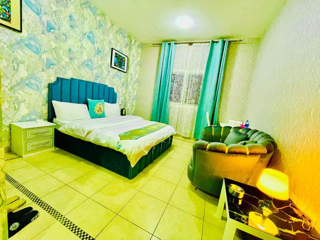 Postel nebo postele na pokoji v ubytování Jin Jie Residence
