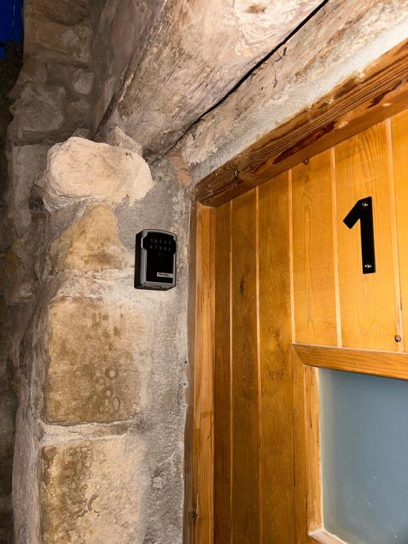 Televízia a/alebo spoločenská miestnosť v ubytovaní Clauhomes Casa Rural Deluxe