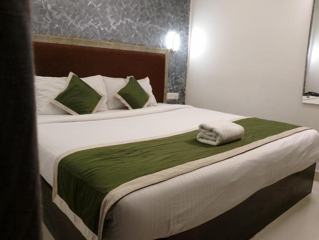 Postel nebo postele na pokoji v ubytování Hotel Greenlife