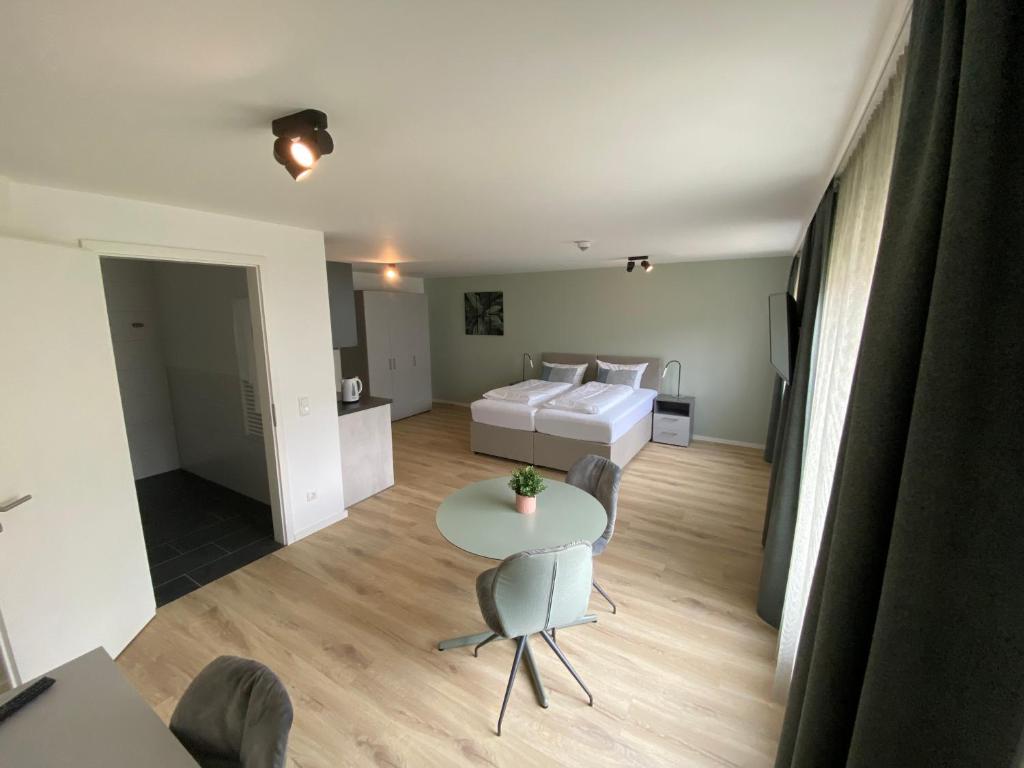 Postel nebo postele na pokoji v ubytování Snooze Apartments Alling