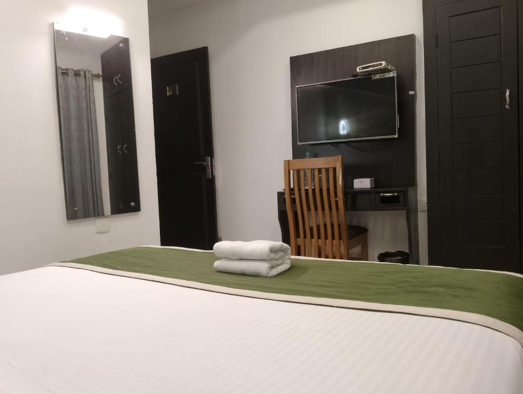 Postel nebo postele na pokoji v ubytování Hotel Greenlife